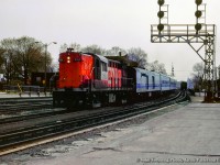 Moments after VIA 86 behind MLW FPA-4 VIA 6772 has departed, VIA 85 slows to a stop at Brantford behind leased CN Tempo RS18m 3153.

<br><br><i>John Freyseng Photo, Jacob Patterson Collection Slide.</i>