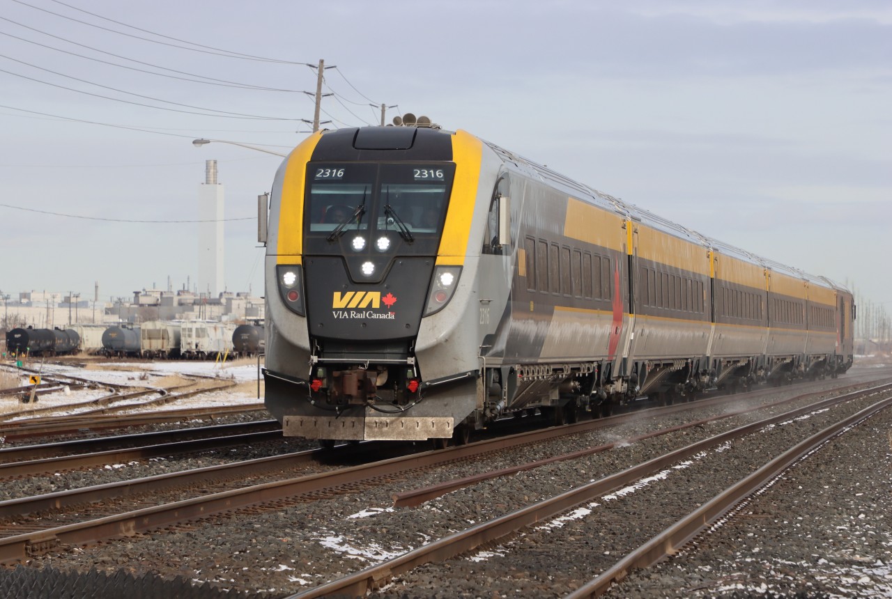 Operating on time V73 with Siemens trainset approaching the next scheduled stop at Oakville.