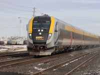 Operating on time V73 with Siemens trainset approaching the next scheduled stop at Oakville.