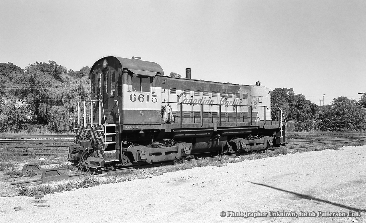 CPR MLW S11 6615 is assigned to the Guelph yard job, seen parked downtown on the former ramp track.

Original Photographer Unknown, Jacob Patterson Collection Negative.