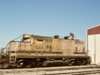 Carrying on from CWRL 7438 as posted last Sunday, here is CWRL 4301 on the opposite end of the engine shed at Warden on Saturday 1991-10-05, with grit blasting underway at 1040 MDT in preparation for a new paint job.

<p>CWRL 4301 was nee Pittsburgh & Lake Erie 5680, an EMD GP7 serial 14577 of 1951-09, as rebuilt and upgraded by Morrison Knudsen at Boise in 1979.

<p>Warden is midway between two junctions with the CN Endiang sub. (abandoned by the times I visited, but still quite apparent in Google aerial views), from the east on the south end and to the west on the north side of Warden.