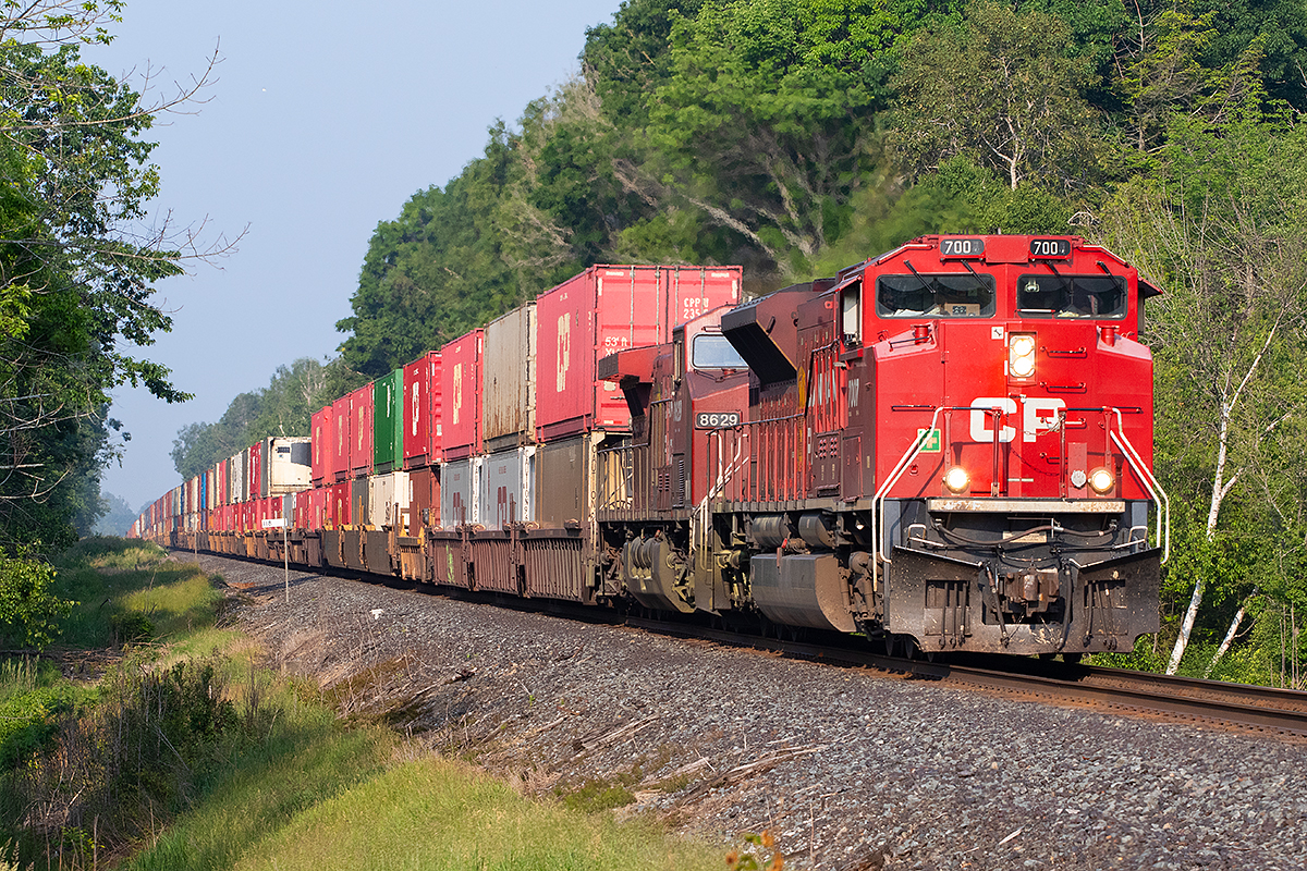 Early morning sunshine meets a rare eastbound CP SD70ACU leader on the Belleville Subdivision.