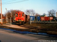 CN 550 with CN SW1200RS 1311 switching cars out and in GM Ontario St. plant at Carlton St.