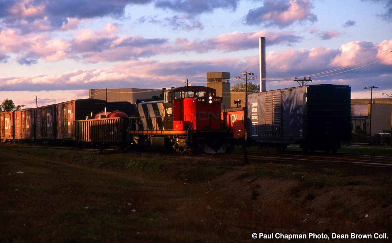 CN 551 with CN GMD1u 1416 working at Yale Cres in St. Catharines.