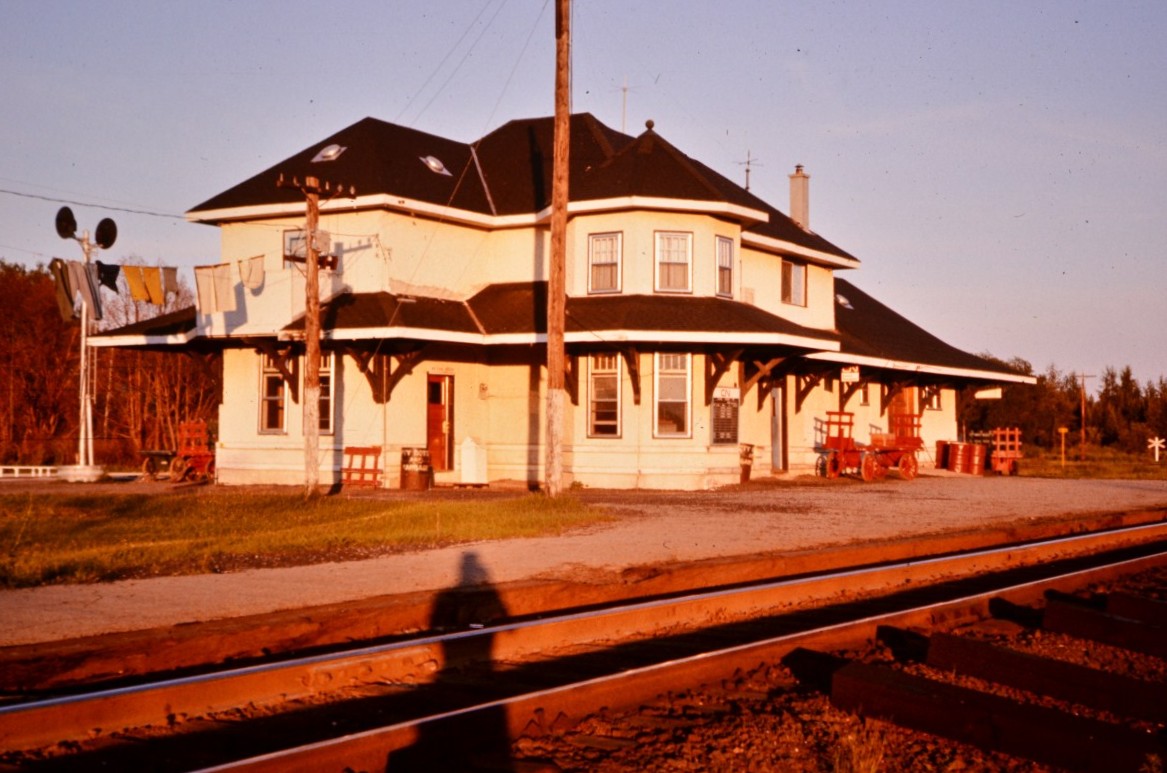 Swaying in the breeze. 
The station agent's family laundry flaps in the late afternoon sun on a warm day in Oba, ON.
Wow! Hard to believe I took this shot 49 years ago this summer. 
Working a CN tie gang on the N.O.D. in the summer of 1976 had me on the Ruel and Caramat Subs from May through October. Oba was a great location to park the gang cars and accommodation units as we had access to the general store and other amenities not found out on the line in remote siding locations. 
Nothing remains of the station or surrounding appliances at this location in 2025.