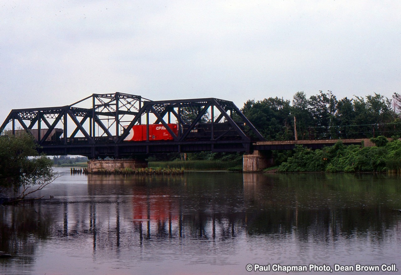 CR GP9 7433 Northbound departing Montrose and crossing over the Welland River on their way back to Welland.