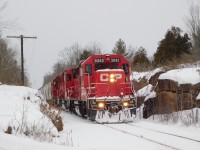 H06 cuts through the rocks at Mile 10 Nephton sub. This is the first GP38-2 to lead on this line in nearly a year so I couldn't miss the opportunity to give it a chase. 3042 happens to be a pretty nice unit with the cab Mounted bell and fairly clean paint job.