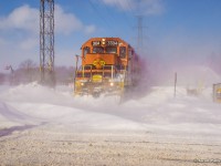 With winds gusting around 50kph, GEXR 583 creeps up to Woodlawn Road light power.  Sent to lift the CN interchange ahead of GEXR 582's arrival (they are following about 15 minutes behind), they would work their way west to PDI Massey, cleaning and lining switches for 582 along the way.