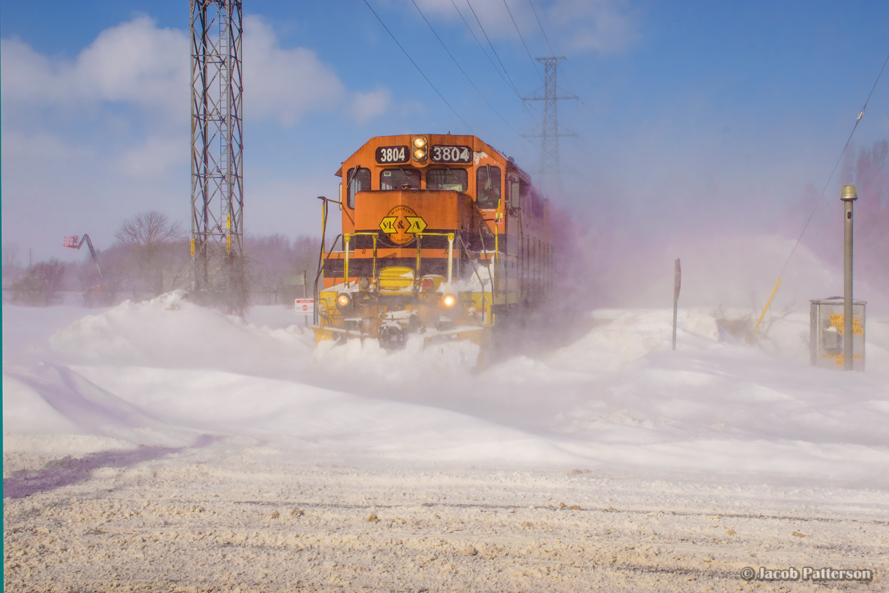 With winds gusting around 50kph, GEXR 583 creeps up to Woodlawn Road light power.  Sent to lift the CN interchange ahead of GEXR 582's arrival (they are following about 15 minutes behind), they would work their way west to PDI Massey, cleaning and lining switches for 582 along the way.