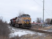 Nearing the end of their journey from Sarnia to Garnet, UP 8217 and CN 2985 lug their 30 car train around the bend as their about to cross highway 6. I'd like to submit this to the "Time Machine" to pair with Bruce Acheson's 1990's posting from this location http://www.railpictures.ca/?attachment_id=47962
