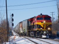 Grain train CPKC 328 is crossing over at Dorval. It is bound for Albany.