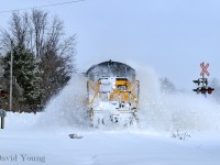 Blowing up the windrow's, St. Thomas bound after a snow storm.