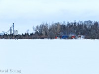 Working their way towards London, the crew of L540 is tasked with opening the Guelph Sub back up after a pair of heavy storms passed thru and no movements closed it over the weekend. The trio of geeps spell a bit of exhaust pushing the spreader and kicking up some snow as they lumber along at lazy speeds not exceeding 15 mph. It appeared as tho the old spreader wasn't 100% with one wing chained. The crew will run into London, wying at Pottersburg and returning towards Stratford, meeting 568 at Kellys.