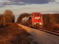 CP H62 is trundling into the sunset enroute to Innophos Canada in Port Maitland along the former CASO Mainline. 