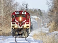 Ontario Southland’s last in service MLW unit RS18U 182 teams up with former CP GP9U 8235 as they bring a cut of auto rack from the CN interchange over to the Cami plant in Ingersol’s west end. The tank cars in the cut will later make it over to the CP interchange in Woodstock. 