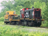  Mini-storage line of Trillium back in mid-2008.  I assume these all were lined up for scrapping.  Shown are TRRY 117 (MLW S-13), Slug 168 (from MLW S-3) and caboose TR420596, formerly CP.