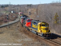 Such was the scene at Hamilton West in 2006. Searchlight signals everywhere, about two trains every hour on average, and on this day I photographed 11 moving trains in 5 hours, starting with NS 328 at Parkdale at 0837. After this I went home.<br><br>
CN's bought some of the four axle BNSF fleet in all manner of paint schemes. Question for your BNSF fans, do any of these exist as four axle active on BNSF still? I know shortlines have these all over the place. Anyway, this was back in the Foreign Power days of CN, check this account by <a href=https://groups.io/g/FPON/message/642 target=_blank>Arnold Mooney for the day's activities</a> and a tip of the hat to Mr. Mooney for posting as I don't take many notes and his notes filled in info I used for this caption. I would shoot 3 in this scheme in 3 months in 2006 in Ontario. We also didn't chase them - why would you when you had so much good stuff coming?