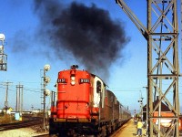 Tempo 3151 smoking it up leaving Burlington West Station WB