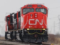 CN L502 rests in Garnet yard in Garnet, ON, on a cold frigid winter day. This train would feature 2 brand new rebuilt SD75IACCs, rebuilt from SD75is.