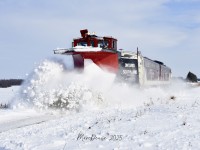 Southern Ontario winter's have been reasonably mild in recent years but this winter has been an exception. A week earlier OSR ran their plow job through much heavier snow drifts, however on this day it was more of a clean up mission. Here they are about to cross Ferguson Line just southwest of Belmont, ON., with the F units supplying the power.