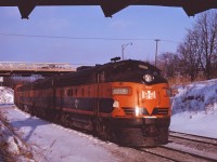 Here's another shot from early 1964 when CN was leasing B&LE F units due to a traffic surge. The train will continue on into Hamilton and down to Niagara behind its ABBA consist of F7s. (For those not familiar with the setting, I'm standing below the old Snake Road bridge and that is the old Plains Road bridge in the background.)