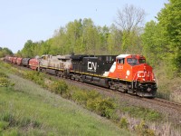 On the return trip, CN 570 (Aldershot-MacMillan Yard turn) makes good time heading downhill past mile 30 on the Halton sub. Power is recently rebuilt AC44C6M 3312 (originally 2615) and ES44AC 2777 (formerly CREX 1337, acquired by CN in 2022).