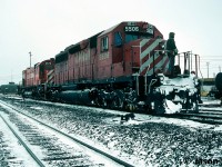 When the calendars were flipped to 1995, CP Rail had 163 units leased operating through Canada and the US to assist with their motive power constraints. At the time, my Branchline magazine from that month showed there were nine VIA Rail F40PH-2’s on lease plus SD40-2’s from Algoma Central and BC Rail. As well as a myriad of other four and six axle power from various leasing companies. By far, Helm Leasing had the most units leased by CP, with Illinois Central, Conrail Leasing, GATX Leasing, Generation II Leasing and Precision National providing many as well. Railfans had dubbed them “rent-a-wrecks” and to many it was reminiscent of the previous great CP 1970’s lease fleet. Not to be overlooked, the preceding spring CP had re-activated 33 big MLW’s from retirement, which included a mix of C-630M’s, M-630’s and M-636’s. By winter 1995, only 27 remained active, some of which had their cab windows boarded over as they were mainly trailing units only. As each month went by in 1995, the groups numbers would shrink less and less as they were retired following major failures. Also, by 1995 CP had a group of rebuilt SD40-2’s on order from Morrison–Knudsen as well as the railway’s first order of GE locomotives ever, in the form of 83 new AC4400CW’s. The MK units were due for a spring arrival and the GE’s were expected in late summer. Additionally, the railway would go on to purchase several yellow GATX SD40-2’s that they were leasing. All of these acquisitions would ultimately see all the Big M’s retired by the end of August. 
<br>
Here, during a frigid morning CP SD40 5506 and M-630 4573 (the last M-630 in the number series) are viewed preparing to depart the Toronto yard diesel shop tracks for possibly an eastbound train on the Belleville Subdivision. On August 23, 1995 CP officially retired 4573 and later sold it to the Minnesota Commercial Railroad in 1996 where it became MNNR #73. Many years later it was sold to the Western New York & Pennsylvania Railroad, becoming WNYP #631.
