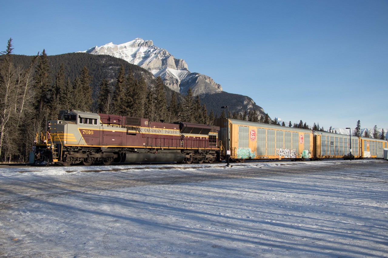 CP 7016 is a fine sight in classic maroon and grey paint as it heads west through Banff with Bensenville-Deltaport train 149.