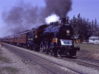 Credit Valley 4-6-0 1057 (Ontario Rail Association) approaches the Winston Churchill crossing east of Georgetown on a special run to Toronto Union Station, celebrating the commencement of GO Transit service to Georgetown in April 1974. This special run was made on the Saturday prior to opening and the first revenue GO trains ran on Monday 29 April 1974.