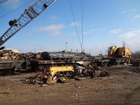 <b> Scrap on Scrap </b> <br>
Ten years ago next month I was at Gerdau Ameristeel (Mandak Metals) in Selkirk, MB inspecting their locomotive crane fleet and came across two interesting pieces of equipment at the same time. <br>
D&H 16156 an 8-axle heavy duty flatcar, and its load, CP 420932 Scale Test Car were on one of the scrap lines waiting their turn to be cut up. <br>
On either end of this find was a pair of American locomotive cranes also sitting out their final days.