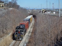 Well, that's it. As plain and unassuming as the black paint on the former CP RS-18u, TRY 1859 heads up the Canal Sub one last time before the line would be mothballed to its current state. As far as I am aware, this was the last train to pass over this segment between Merritton and Thorold. The track between Welland to Thorold is still in service as tank cars are still being stored behind Poly. 