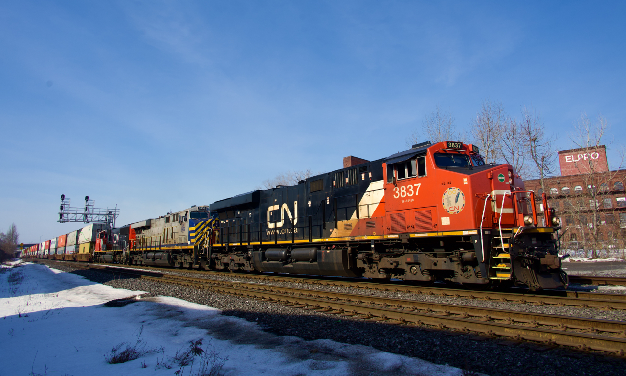 CN 120 is about to cross Courcelle Street with three units up front, on its way to Halifax.