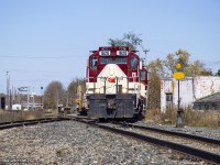 Building their train, OSR's repainted GP9us lift a cut of flatcars loaded with steel destined for the transload at Ingersoll.  