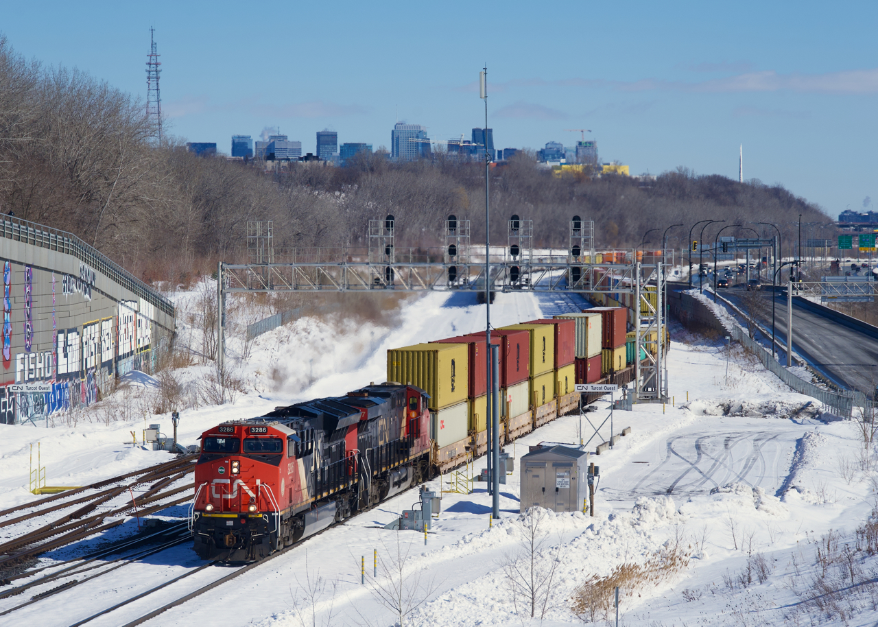 CN 149 is through an s-curve as it passes Turcot Ouest with CN 3286 & CN 3817 for power