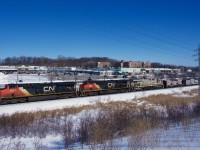 CN 369 has three gevos as it heads west. The aluminum cars up front will be set off at Brockville.