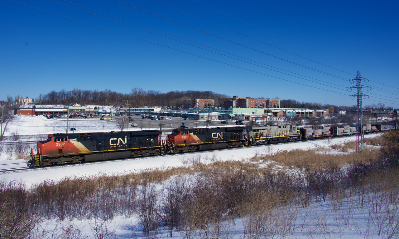 CN 369 has three gevos as it heads west. The aluminum cars up front will be set off at Brockville.