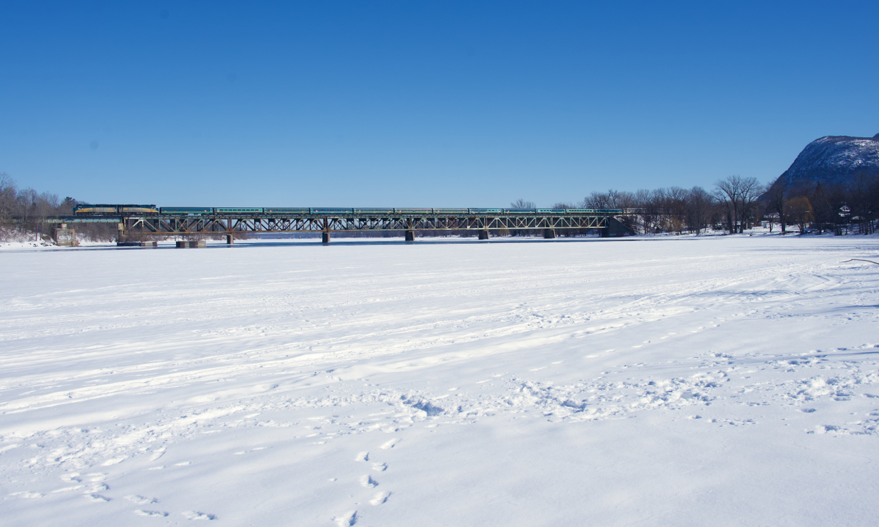 VIA 15 from Halifax crosses the Richelieu River, its run fairly close to done.