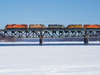 With CN refusing to take any cars from the St. Lawrence & Atlantic, SLR 520 is heading to Southwark Yard light power as it crosses the Richelieu River. Full consist: SLR 4022, SLR 3007, QGRY 6904, SLR 3047 & SLR 4024.