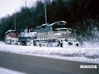 Goderich-Exeter Railway train 581 is pictured reversing light power at the Goderich, Ontario harbor where it will lift several hoppers from the large Sifto salt mine. Powering the consist are GEXR GP38 3821, GSWR GP7u 2127 and GEXR GP9 177.
