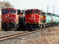 L551 CN 9461 CN 4959 is stopped at Mile 44.1 Halton Sub. and will wait as Eastbound CN 3831 CN 3401 with 130 cars trailing up the grade at 17 mph on the South Track with a Clear Signal on the Advance to Tansley.