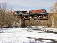 Canadian content, it’s been over a year since I’ve been down here so was worth a revisit. Over than animal footprints the snow here is untouched and it’s a nice piece of country in the city. To the right there is new construction starting so not sure what the future holds here. Today CP 134 has a decent CP / CN consist as it soars over the Credit River. 