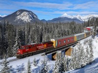 CPKC 113-20 crosses the Ottertail River, near the start of their journey between Field and Revelstoke on the aptly named Mountain Sub. 