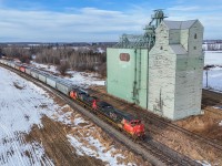 McLennan to Edmonton, G 84851 03 rolls past the elevator at Dapp, Alberta with CN 2507 and CN 2509. 