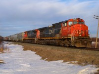 G 84851 03 climbs the grade towards Busby, Alberta with CN 2507 and CN 2509. 