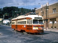 TTC PCC 4527 (A9-class, built CC&F 1951) operates on a Bathurst CNE run, heading southbound on Bathurst Street just below Davenport Road passing the turn-in tracks into TTC's Hillcrest Shops.
<br><br>
Operating for nearly four decades, 4527 was not rebuilt into an A15-class PCC, and continued to operate in service until being retired in 1988 and sold for scrap.
<br><br>
<i>Original photographer unknown (duplicate slide), Dan Dell'Unto collection slide.</i>