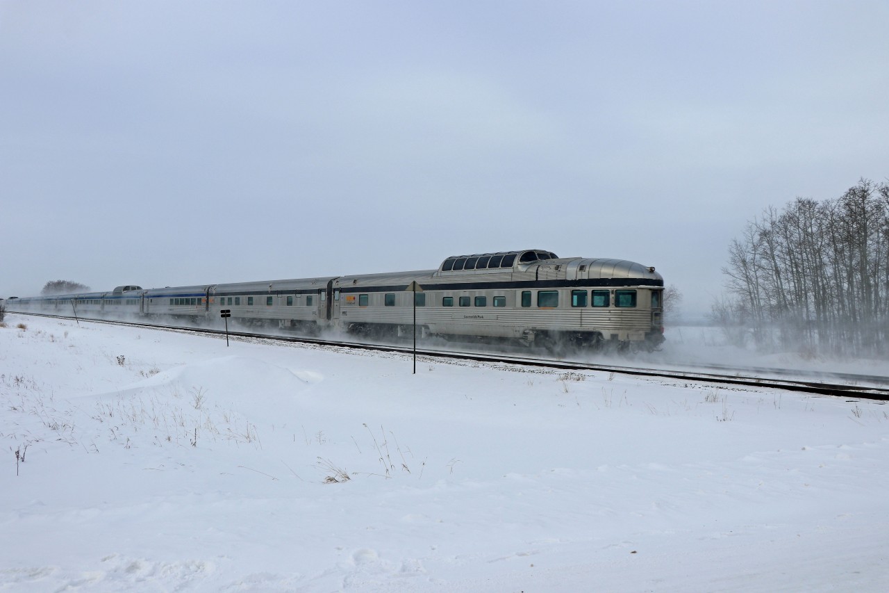 Here's the going-away shot of the 10 hour late Canadian...Laurentide Park on the rear.