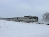 Here's the going-away shot of the 10 hour late Canadian...Laurentide Park on the rear.