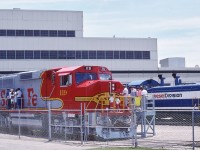 <br>
<br>
classic livery ...originally designed for the first generation units...
<br>
<br>
 and to see a second (third?) generation unit in the warbonnet livery...quite special,
<br>
<br>
GMDD GP60M  ATSF #119  on display for guests' inspection
<br>
<br>
At GMDD London Open House, June 16, 1990 Kodachrome by S Danko
<br>
<br>
And in the background:
<br>
<br>
GMDD #57, SW9 serial #A123 built by GMD January 1951 for the TH&B, acquired May 1989
<br>
<br>
plus an unknown CP Rail unit # ? , anyone?
<br>
<br>
and a lament....
 <br>
<br>
 …. once upon a time Canada had three major diesel locomotive manufacturers: CLC Kingston (F-M licensee), MLW Montreal ( ALCO licensee) and GMDD London (EMD licensee).....market influences along with federal government policies (absent, weak and/or lacking thereof).....now all extinct....
