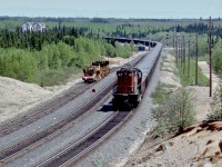 <br>
<br>
Long before DPU's....
<br>
<br>
Remote controlled MLW 1973 built M-636 #47 (ex CN 2312) handles tail end braking duties,
<br>
<br>
for a  typical 132 car iron concentrate train...
<br>
<br>
at Able, mile 9.2 South Subdivision Cartier Railway (QCM)
<br>
<br>
June 8, 1981 Kodachrome by S.Danko
<br>
<br>
     <a href="http://www.railpictures.ca/?attachment_id=  47459 ">  head end  </a>
<br>
<br>
sdfourty